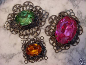 Examples Of Filigree Wrapped Rhinestones Glue On Top Of A Larger Hand Oxidized Filigree