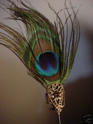 This Peacock Feather Hat Pin Was Made With Our Oxidized Brass Hat Pin Findings Topped With An Oxidized Brass Bow Shapped Filigree And A Bezel Set Vintage 6x4 Swarovski Crystal Amethyst Cabochon